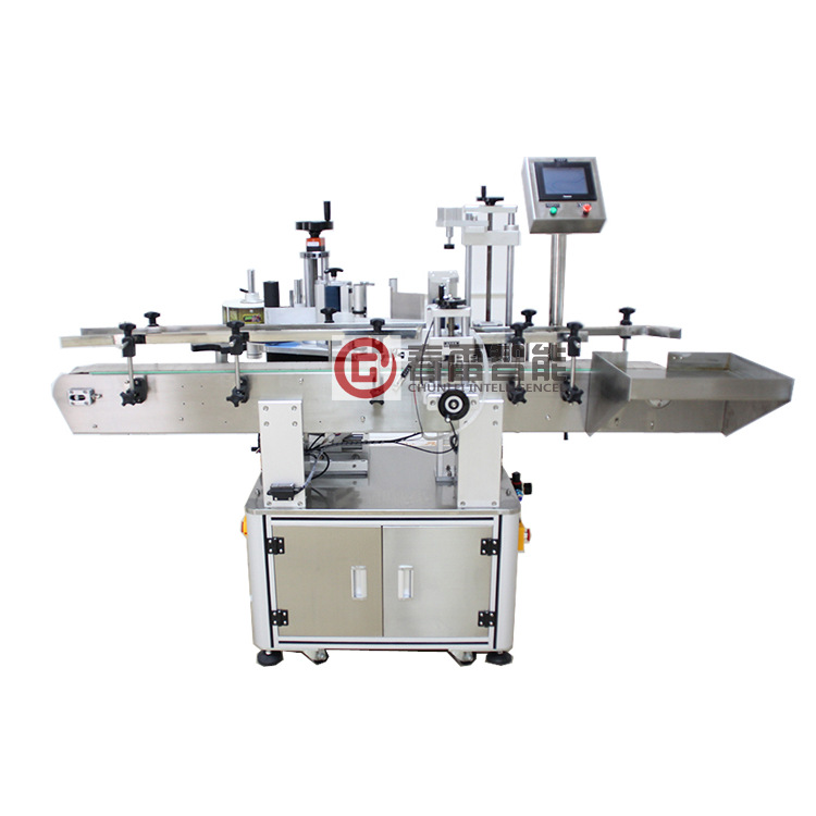 自動毎日化学薬品丸ボトルラベル貼付機